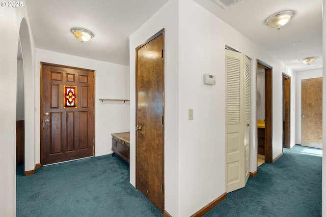 1521 Ranch Rd, Reedsport, OR 97467 - hall featuring dark carpet and baseboards