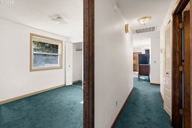 1521 Ranch Rd, Reedsport, OR 97467 - corridor featuring carpet flooring and baseboards