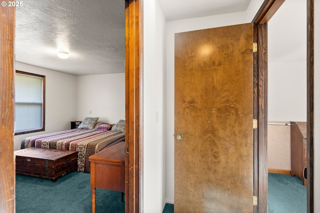 1521 Ranch Rd, Reedsport, OR 97467 - bedroom featuring carpet and a textured ceiling