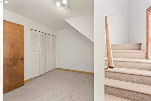 1521 Ranch Rd, Reedsport, OR 97467 - staircase with carpet floors and baseboards