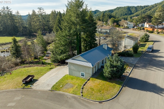 1521 Ranch Rd, Reedsport, OR 97467 - drone / aerial view of a mountain backdrop and a heavily wooded area