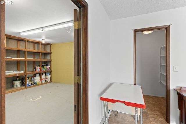 1521 Ranch Rd, Reedsport, OR 97467 - hallway featuring a textured ceiling