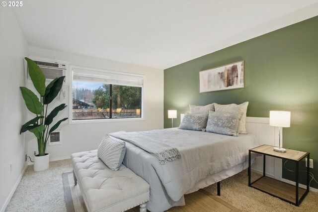 29460 SW Volley St Unit 67, Wilsonville, OR 97070 - bedroom featuring carpet floors, an AC wall unit, and baseboards