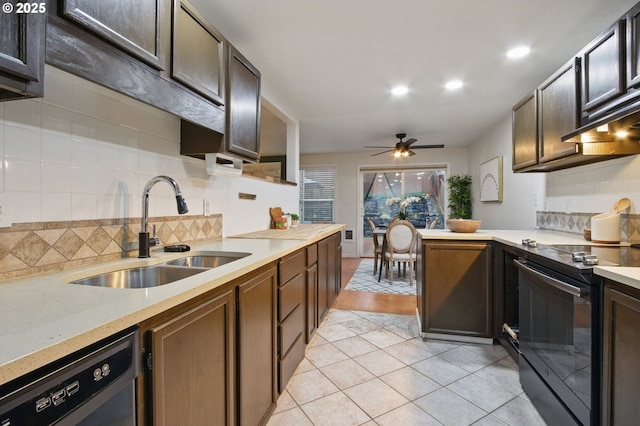 kitchen with black range with electric stovetop, light countertops, dishwashing machine, light tile patterned flooring, and a sink