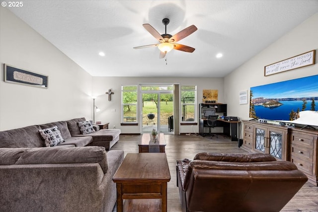 445 Hatfield Dr, Roseburg, OR 97470 - living room with lofted ceiling, a desk, wood finished floors, a ceiling fan, and recessed lighting