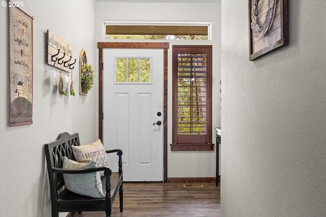 445 Hatfield Dr, Roseburg, OR 97470 - entryway featuring plenty of natural light, dark wood-type flooring, and a textured wall