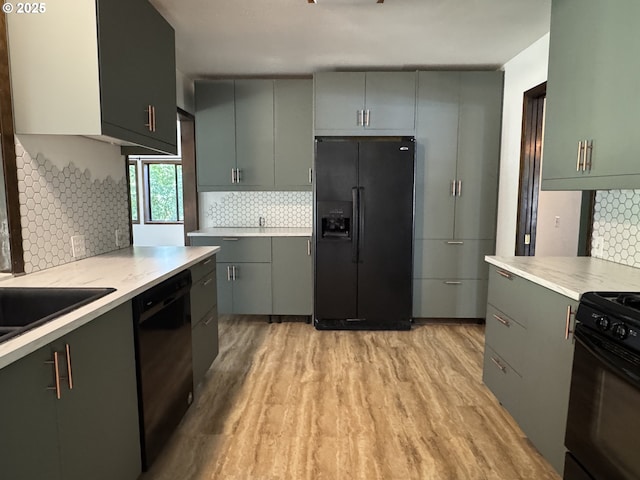404 NE High St, Goldendale, WA 98620 - kitchen with black appliances, tasteful backsplash, and gray cabinets