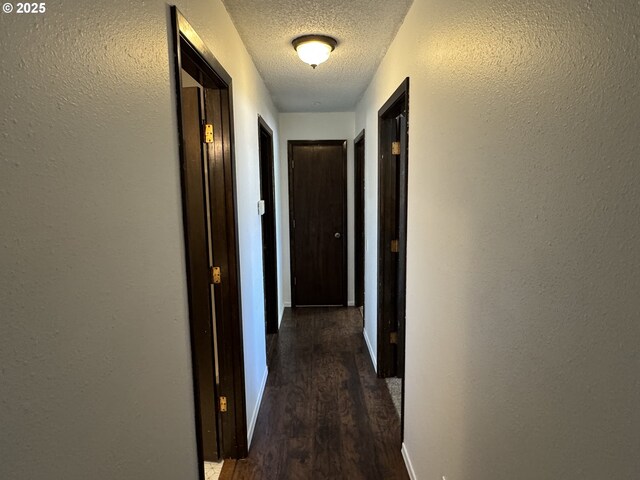 404 NE High St, Goldendale, WA 98620 - bathroom featuring vanity, baseboards, toilet, and a shower