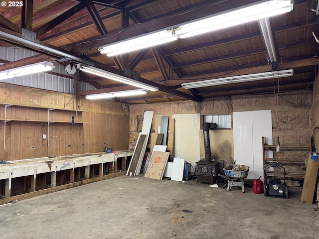 404 NE High St, Goldendale, WA 98620 - garage featuring a workshop area and a wood stove
