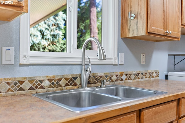 16880 Tracy Ave, Lake Oswego, OR 97035 - kitchen featuring light countertops, a textured wall, and brown cabinets