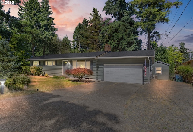 16880 Tracy Ave, Lake Oswego, OR 97035 - single story home with asphalt driveway, a garage, and a chimney