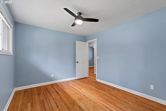 16880 Tracy Ave, Lake Oswego, OR 97035 - unfurnished room featuring ceiling fan, light wood finished floors, and a textured ceiling