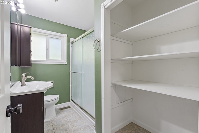 16880 Tracy Ave, Lake Oswego, OR 97035 - full bathroom featuring vanity, a shower stall, and tile patterned flooring