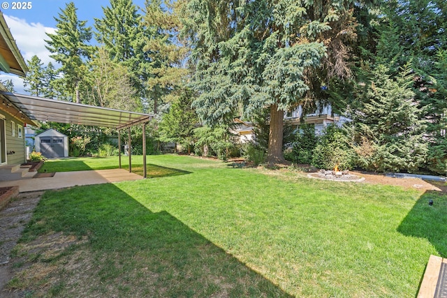 16880 Tracy Ave, Lake Oswego, OR 97035 - view of grassy yard with a storage shed and a patio