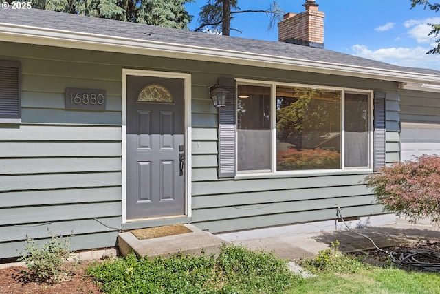 16880 Tracy Ave, Lake Oswego, OR 97035 - view of exterior entry featuring a chimney