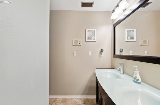 93975 Bridge View Ln, North Bend, OR 97459 - bathroom with baseboards and double vanity