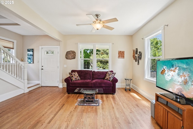 5018 N Vanderbilt St, Portland, OR 97203 - living area with light wood finished floors, healthy amount of natural light, ceiling fan, and stairs