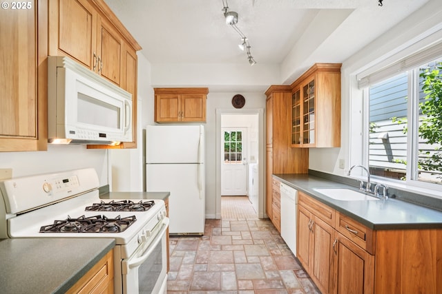 5018 N Vanderbilt St, Portland, OR 97203 - kitchen with white appliances, plenty of natural light, and glass insert cabinets