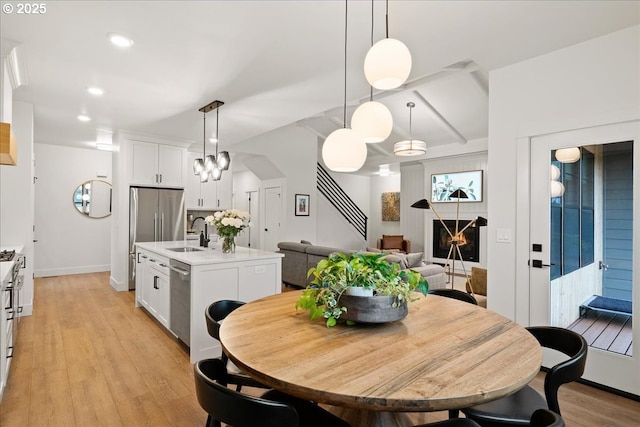3653 Maidenhair Pl S, Salem, OR 97302 - dining room with baseboards, light wood-style floors, and recessed lighting