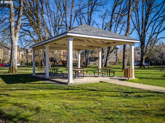 surrounding community featuring a gazebo and a lawn