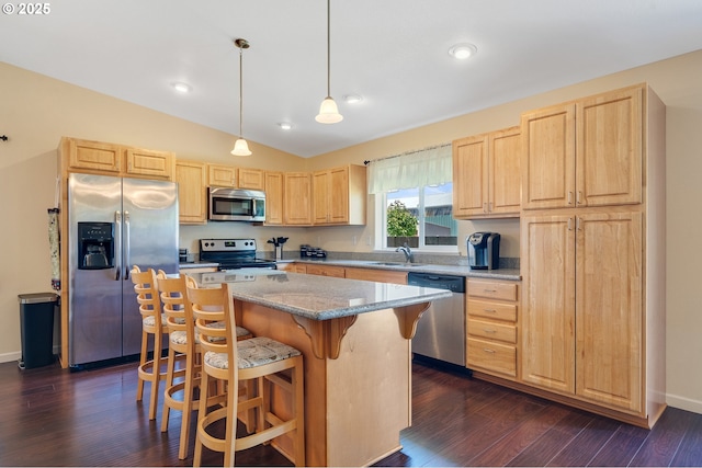 3606 Walnut Ln, Tillamook, OR 97141 - kitchen featuring stainless steel appliances, light brown cabinets, a sink, lofted ceiling, and recessed lighting