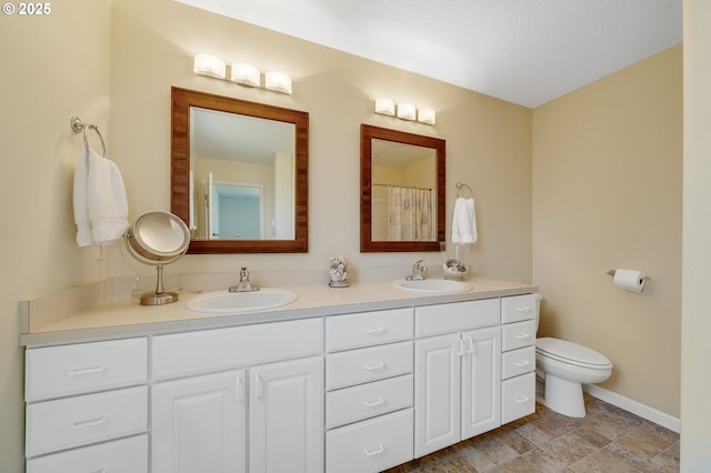 3606 Walnut Ln, Tillamook, OR 97141 - full bath featuring double vanity, toilet, baseboards, and a shower with curtain