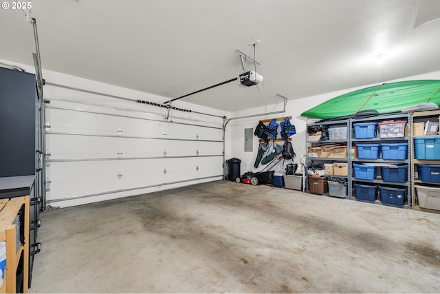 3606 Walnut Ln, Tillamook, OR 97141 - garage with a garage door opener and electric panel
