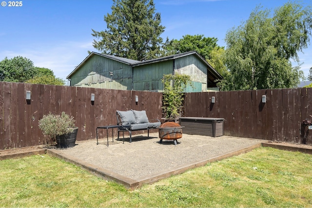 3606 Walnut Ln, Tillamook, OR 97141 - view of patio / terrace featuring an outdoor fire pit