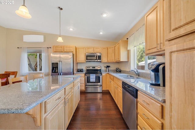 3606 Walnut Ln, Tillamook, OR 97141 - kitchen with appliances with stainless steel finishes, light brown cabinets, a sink, vaulted ceiling, and dark wood finished floors