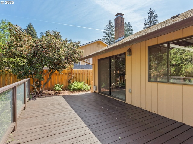 wooden deck featuring fence