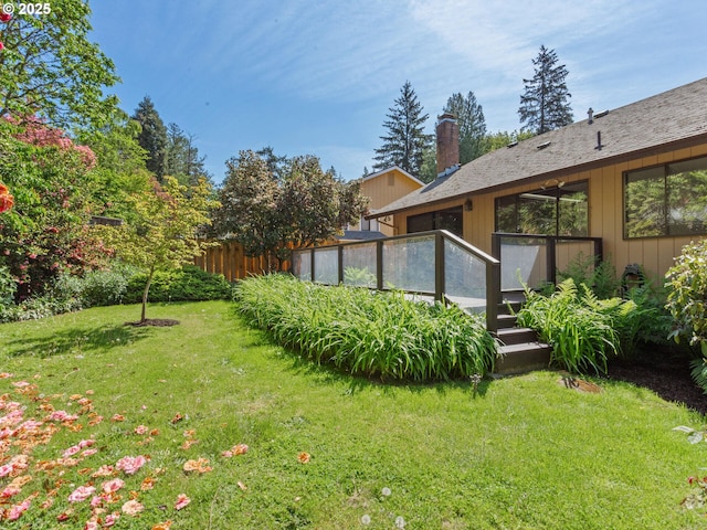 view of yard featuring a deck