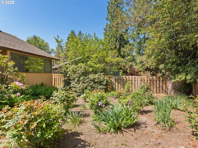 view of yard featuring fence