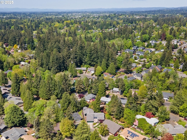 aerial view featuring a residential view and a forest view