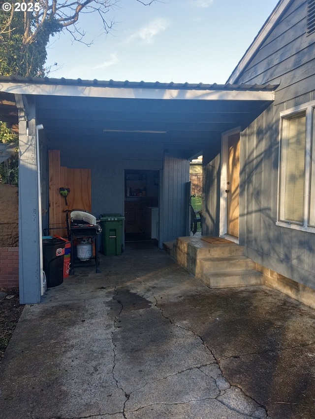 exterior space featuring a carport