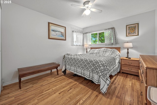 52396 SW 2nd St, Scappoose, OR 97056 - bedroom with light wood-style flooring, baseboards, and ceiling fan