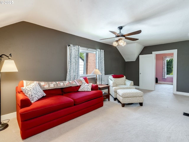 4415 SE Stark St, Portland, OR 97215 - carpeted living area with vaulted ceiling, ceiling fan, and plenty of natural light