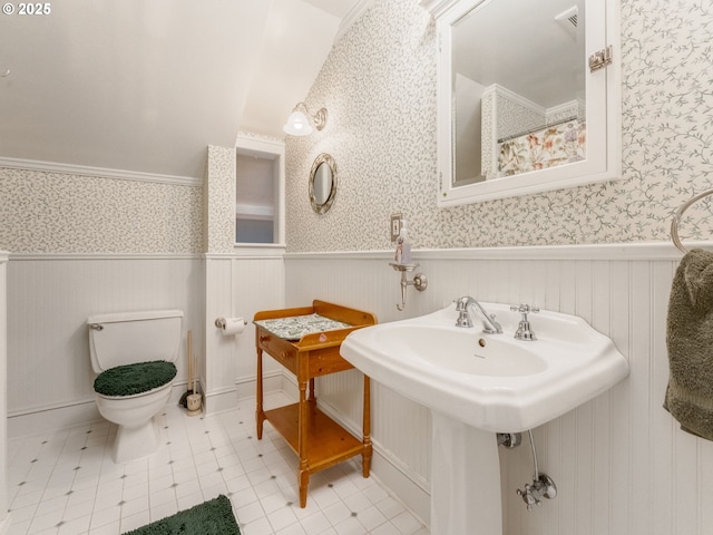4415 SE Stark St, Portland, OR 97215 - full bathroom featuring wallpapered walls and wainscoting
