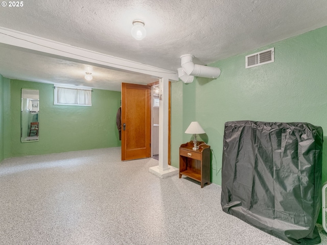 4415 SE Stark St, Portland, OR 97215 - below grade area featuring a textured ceiling and a textured wall
