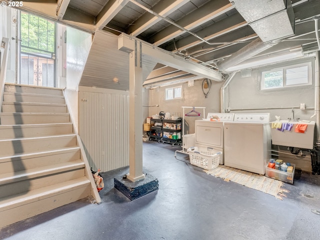 4415 SE Stark St, Portland, OR 97215 - basement with washing machine and dryer, plenty of natural light, and stairs
