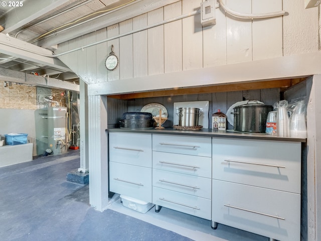 4415 SE Stark St, Portland, OR 97215 - detailed view of water heater and concrete flooring