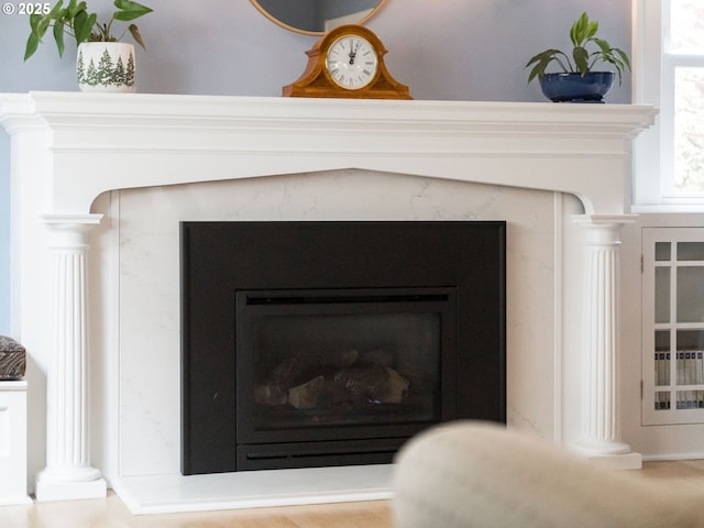 detailed view of a high end fireplace and ornate columns
