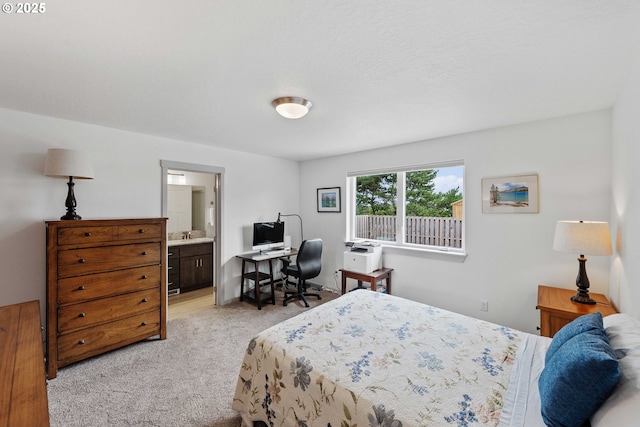 822 Spyglass Dr, Bandon, OR 97411 - bedroom with light carpet, an office area, and ensuite bathroom