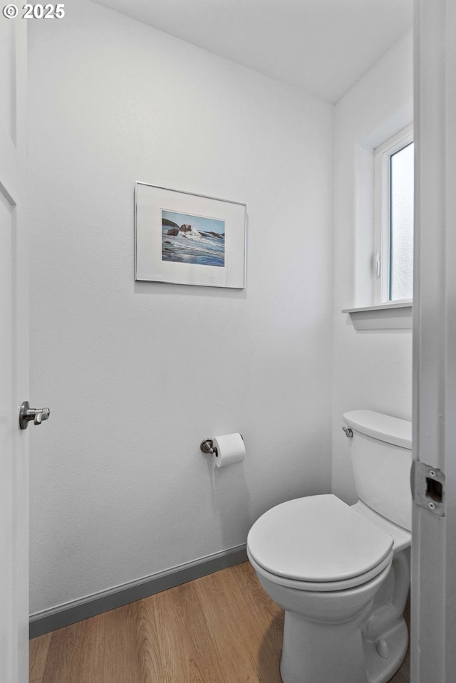 822 Spyglass Dr, Bandon, OR 97411 - bathroom featuring toilet and wood finished floors