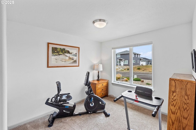 822 Spyglass Dr, Bandon, OR 97411 - exercise area featuring carpet floors and baseboards
