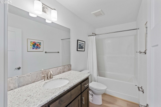 822 Spyglass Dr, Bandon, OR 97411 - bathroom with vanity, shower / bath combo, and wood finished floors