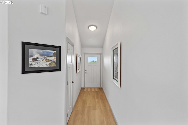 822 Spyglass Dr, Bandon, OR 97411 - entryway with light wood-style flooring and baseboards