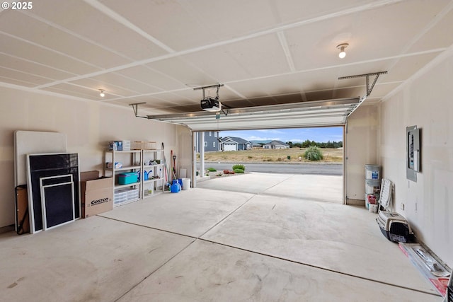 822 Spyglass Dr, Bandon, OR 97411 - garage with electric panel and a garage door opener