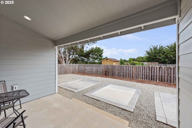 822 Spyglass Dr, Bandon, OR 97411 - fenced backyard with a patio