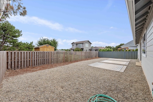 822 Spyglass Dr, Bandon, OR 97411 - fenced backyard with a patio area