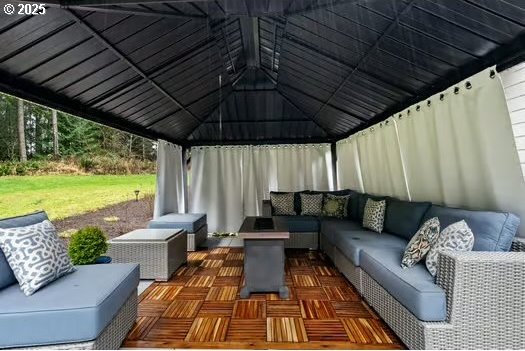 view of patio / terrace with a gazebo and an outdoor living space